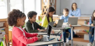 Teachers guiding minds in the digital age modern-elementary-education-concept-group-600nw-2500679775